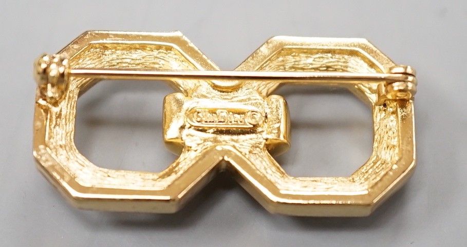 A Christian Dior gilt metal and paste set costume set double octagon brooch, 34mm.
